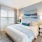 bedroom with bed and large window