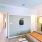 bedroom with bed and wall art