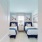 bedroom with 2 twin beds and window