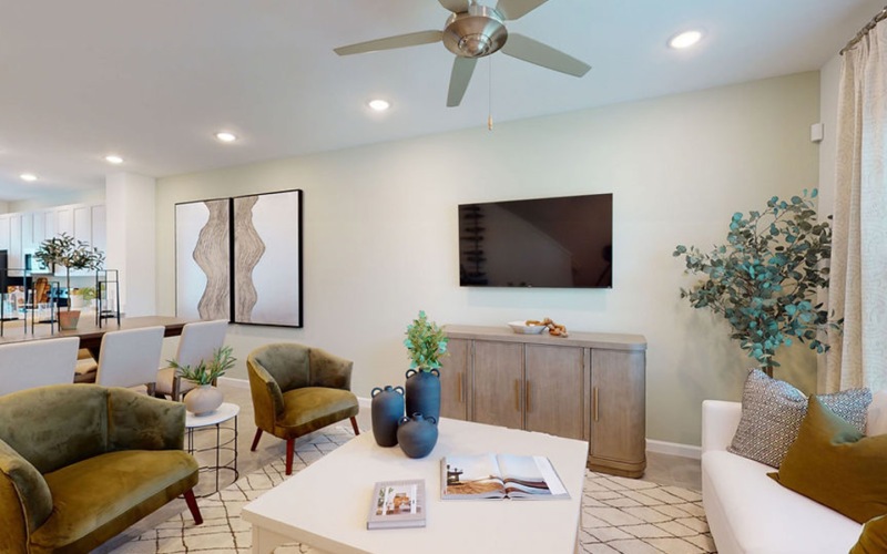 living room with a couch coffee table and tv