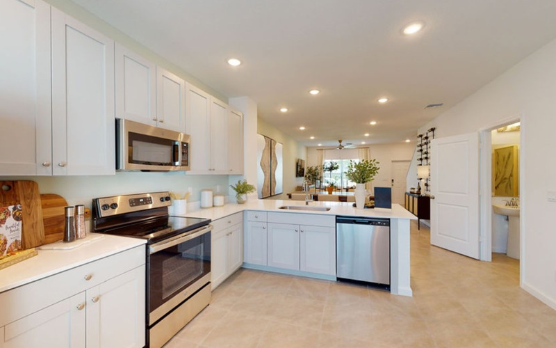 kitchen with white cabinets and stainless steel appliances