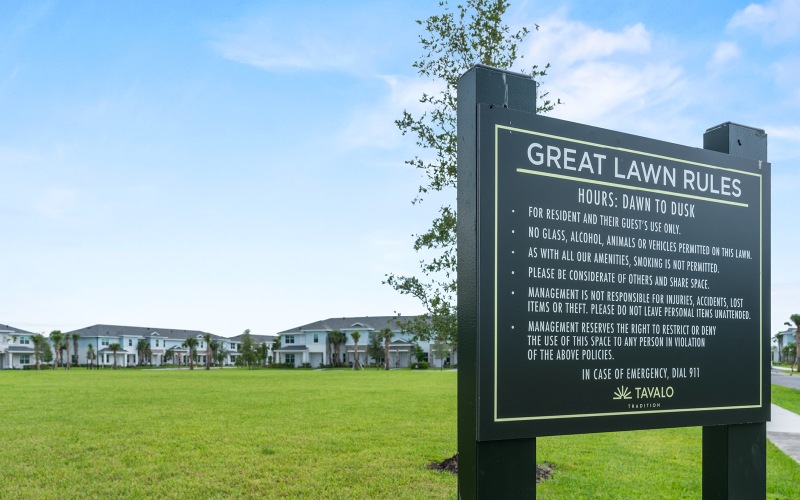 a large sign on a lawn